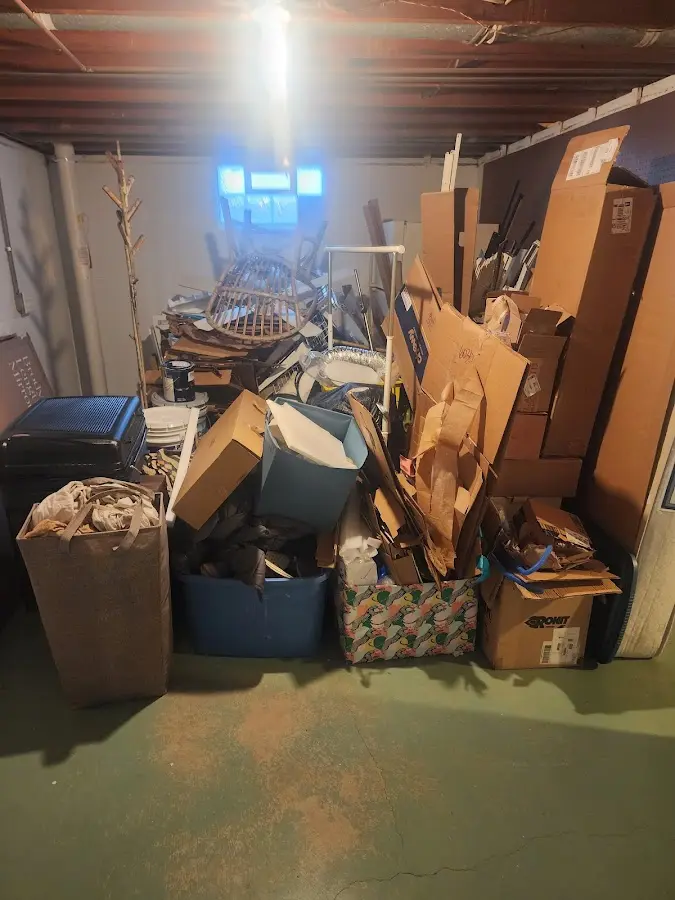 Roll-off dumpster container at job site for 6 Yard Dumpster Rental in Elkins